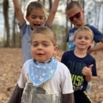 Joshy, who had a kidney transplant, plays outside with his three brothers
