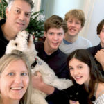 karlijn, who had seizures, poses with her mom, dad, and three brothers