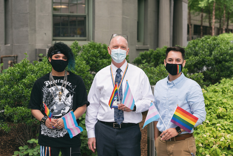 Evan and Brandon pose with Jim Smith, one of the committee chairs for Boston Children’s Rainbow Alliance.