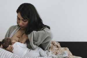 Woman nursing baby