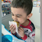 joecel eats a cupcake