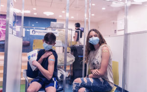 Two teens recently received vaccinations at Boston Children's Hospital.