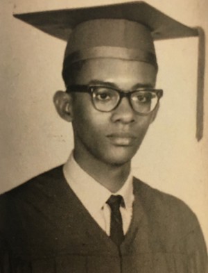 Ron, one of the individuals recognized for Black History month, in a cap and gown. 