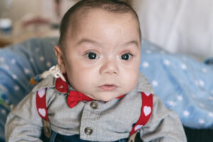 makai wears suspenders and a bow-tie after treatment for short bowel syndrome