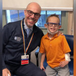 mikey visits with dr carlos estrada, who reconstructed his bladder