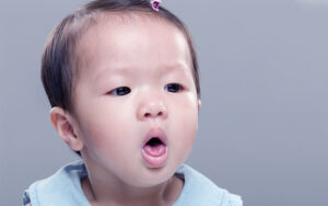 Young boy coughing