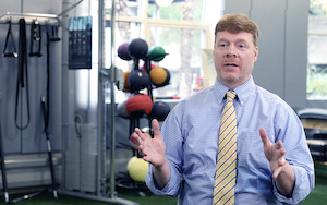 Sports medicine specialist Dr. William Meehan in the gym of The Micheli Center for Sports Injury Prevention. 