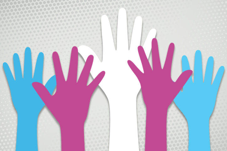 hands in various colors to symbolize the transgender flag