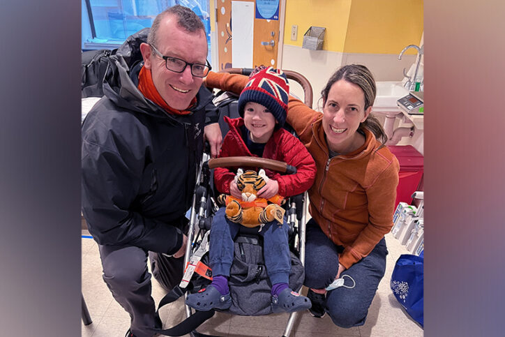 The Blair Winkler pose for a portrait in a Boston Children's Hospital room not long after Levi's surgery. From left, Gabe, Levi, and Rachel.