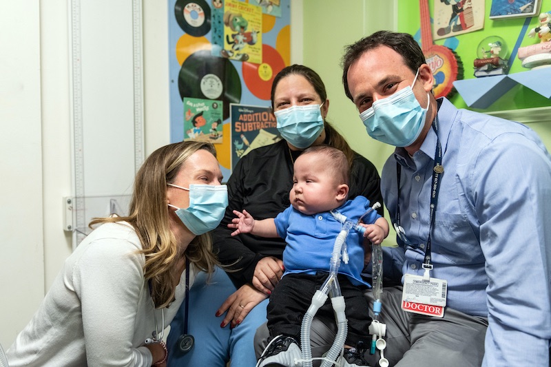 Xavien with his bronchopulmonary dysplasia care team during a follow-up visit.