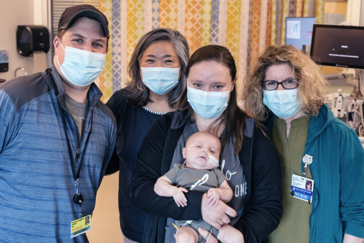 Baby Hank's parents and dialysis nurses. Soon Hank, who has kidney disease, will be released from the hospital and his parents will give him peritoneal dialysis at home. 