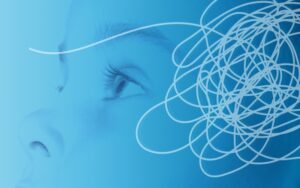 A child’s face and a squiggle to indicate chemo brain or brain fog.