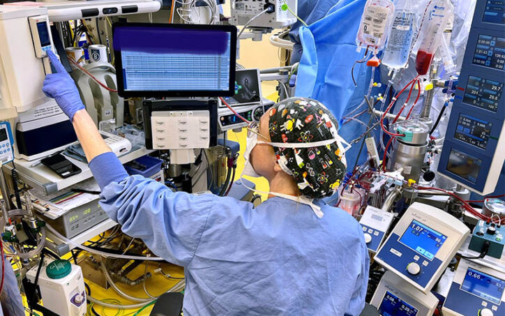 A Boston Children's perfusionist sets the temperature of water that's fed into a heart-and-lung machine.