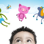 A young boy gazes above his head to see a cartoon frog, bumble bee, pig, and unicorn.