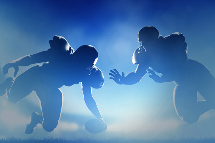 Football players a split second before potential concussion.