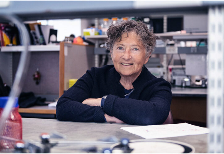 Judy Lieberman, MD, smiling at a lab bench