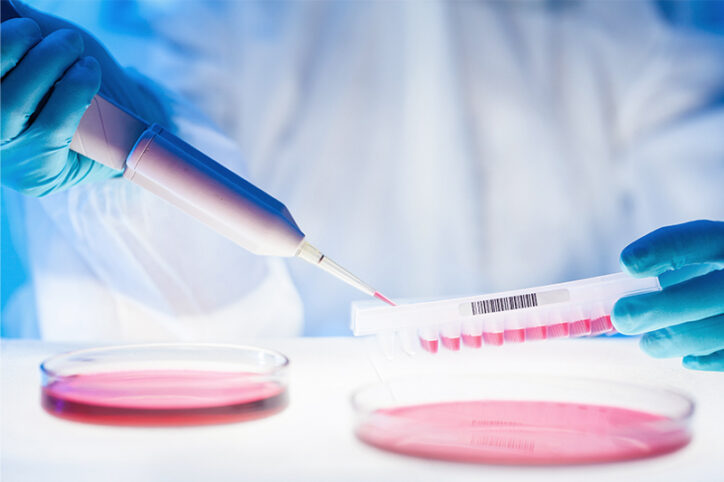 A lab technician works with blood samples.