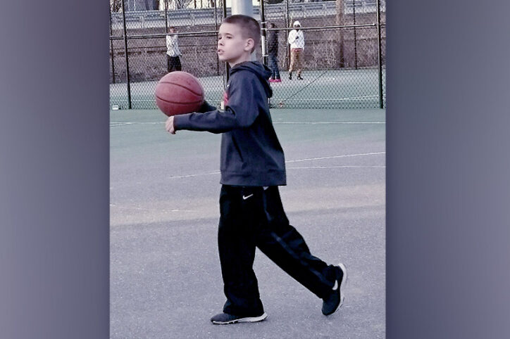 Jace, who had osteochondritis dissecans, playing basketball at a young age.