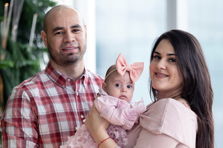 Freddy and Alexandra holding baby Ana Sofia.