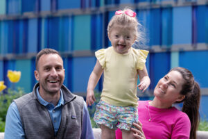 Justin, Catherine, and Isabelle smiling.