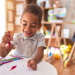 a little boy coloring