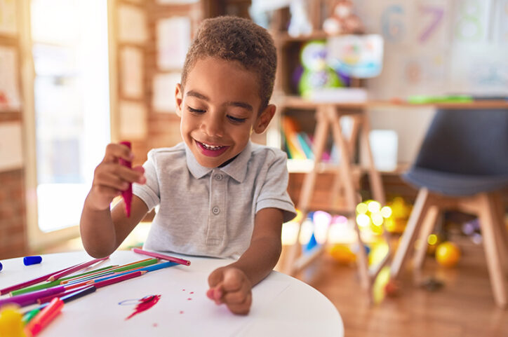 a little boy coloring