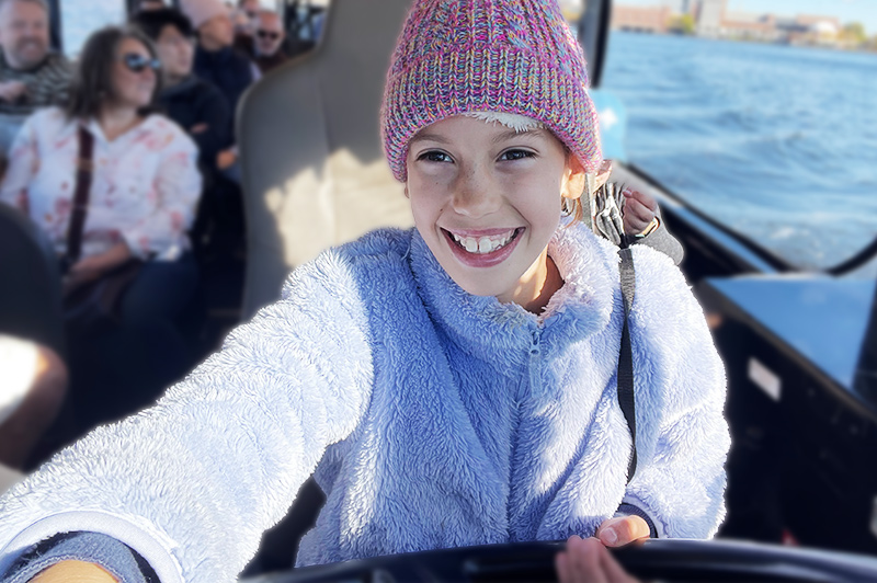 Jenny drives a Boston duck boat after treatment for a glioma