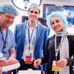 IDS senior development engineer Michael Silver, MFCC fetal surgeon Eyal Krispin, MD, and IDS simulation production engineer Saja Traoui pose with the NTD model.