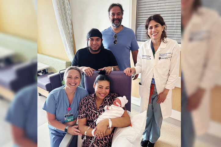 Isaac with his parents and care team