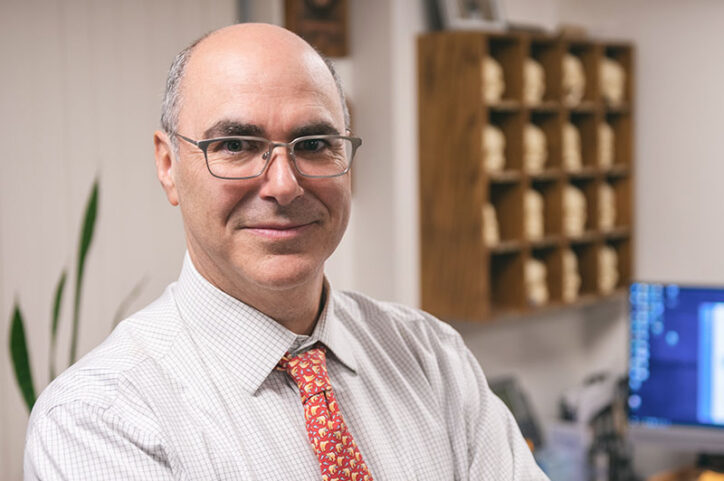 Dr. Mark Proctor, neurosurgeon who specializes in complex cervical spine operations, in his office.