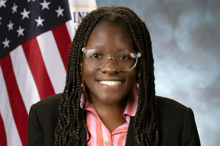 Thelma in a school photo -- her spine is straight and her head no longer tilts to the side.