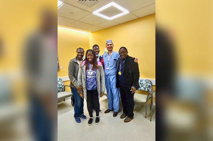 Thelma's parents and siblings meet with her surgeon at Boston Children's Hospital.