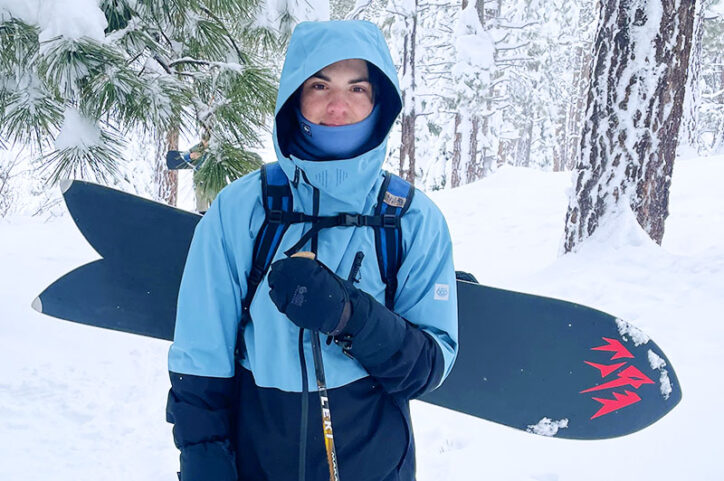 Griffin, who dislocated both kneecaps at different times, in the backwoods of a ski trail with a snowboard.