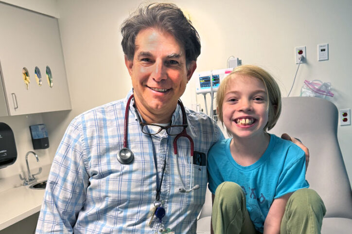 Clara with her cardiologist, Dr. Wayne Tworetzky.