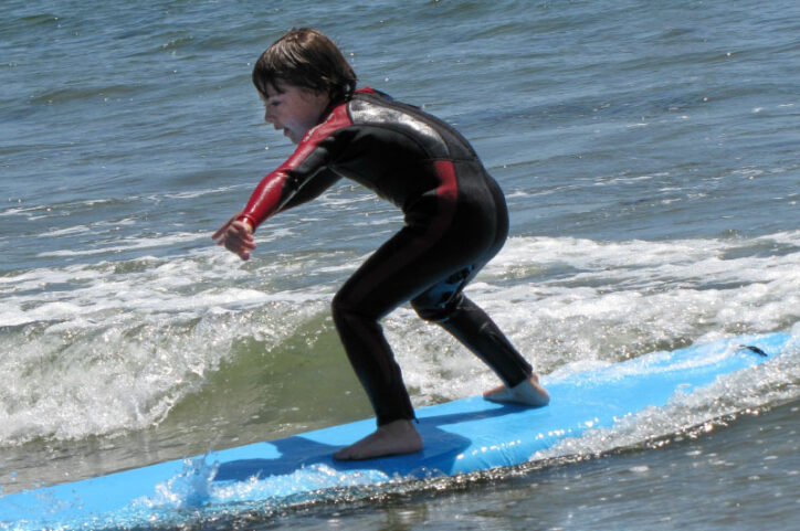 Young Griffin surfing.