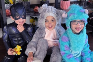 Makai, a short bowel syndrome patient, with his brothers. He is dressed up for Halloween as a monster.