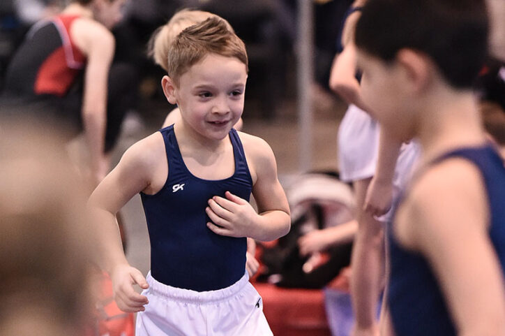 Kaleb at a gymnastics practice at a young age.