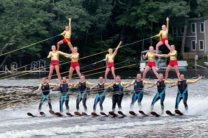 Kathryn atop a pyramid of water skiers