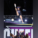 A cheerleader is tossed into the air with one leg extended and arms raised.