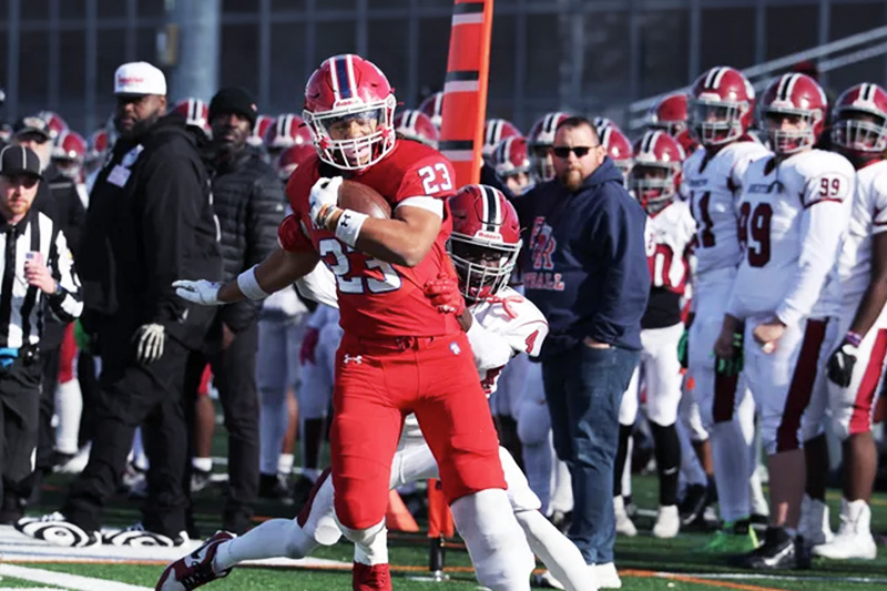 a teen boy playing football