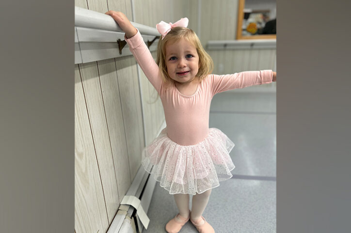 A young girl dressed as a ballerina