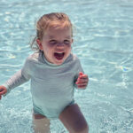 a female toddler in a swimming pool