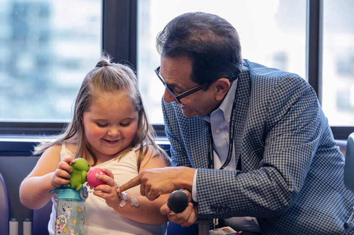 a young girl with her doctor